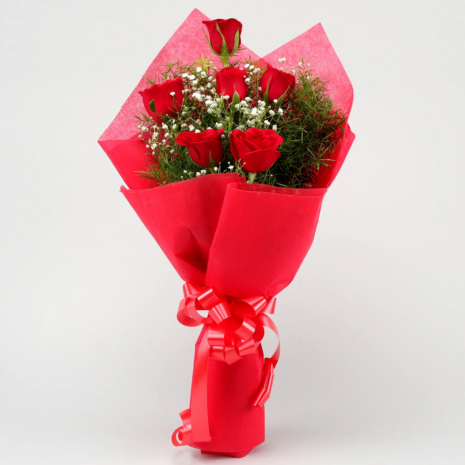 6 Red roses in red paper packing